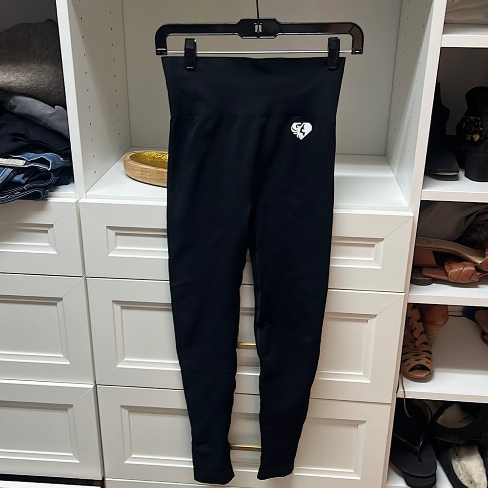 Women’s Best power leggings.  Black, never worn, no tags.  run a bit tight..